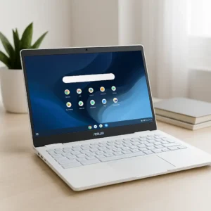 An ASUS Chromebook Plus CX34 laptop with a sleek white design sits on a modern desk, displaying its ChromeOS interface in a well-lit workspace.