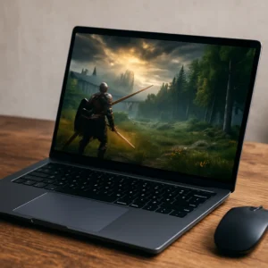 A modern lightweight laptop displaying a fantasy video game scene, placed on a rustic wooden desk with a wireless mouse beside it.